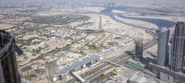 High angle view of cityscape seen through airplane window