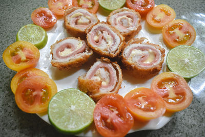 High angle view of chopped fruits in plate