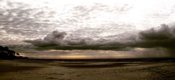 Scenic view of dramatic sky over sea