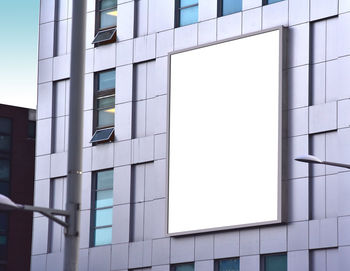 Low angle view of modern building against clear sky