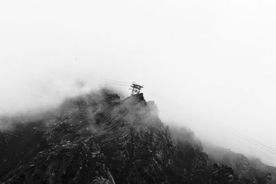 Scenic view of mountains against sky during winter