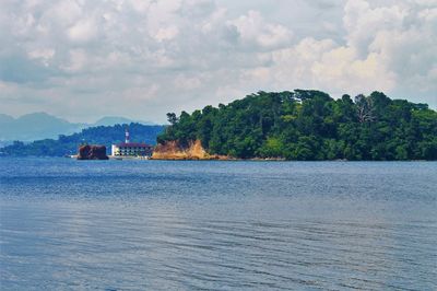 Scenic view of sea against cloudy sky