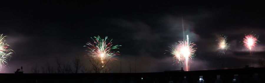 Low angle view of firework display