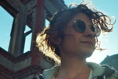 Close-up of young woman wearing sunglasses