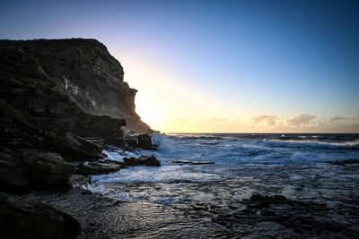 Scenic view of sea against sky during sunset