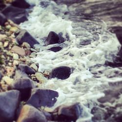 Waves splashing on rocks