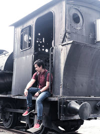 Woman sitting in train
