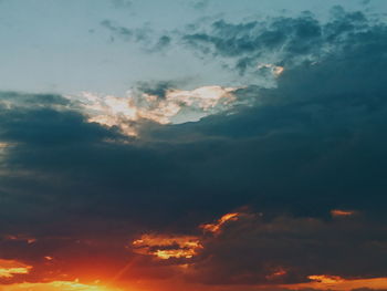 Low angle view of clouds in sky during sunset