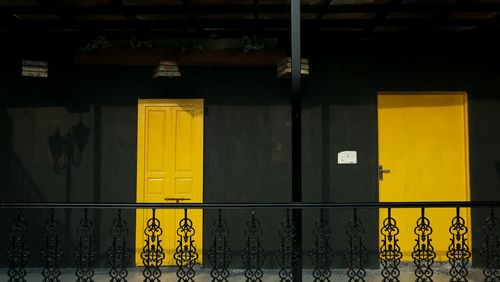 Yellow closed door of house