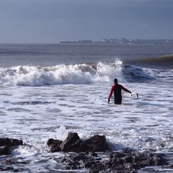 People enjoying on beach