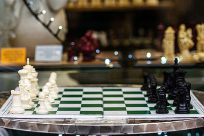 Close-up of chess pieces on board