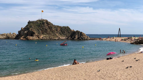 Scenic view of beach against sky