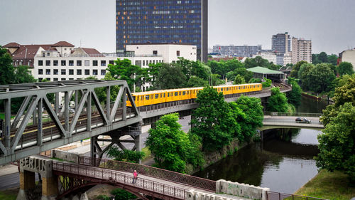 Train bridge over in city