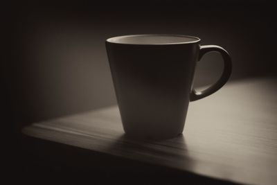 Close-up of coffee cup on table