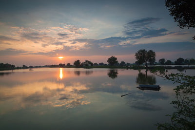 Scenic view of lake during sunset