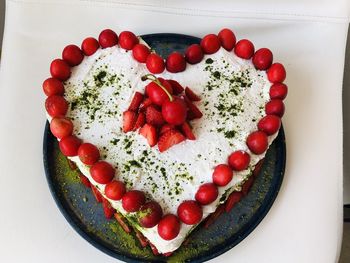 High angle view of strawberries in plate on table