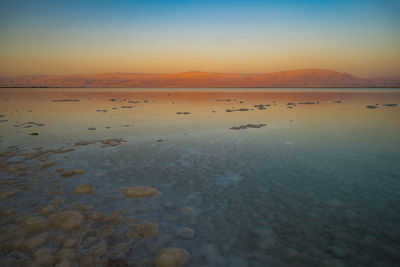 Scenic view of dead sea during sunset