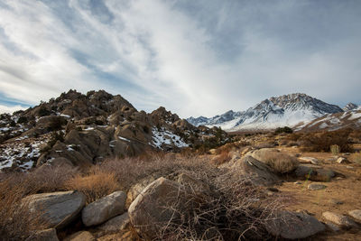 Scenic view of snowcapped mountains against sky