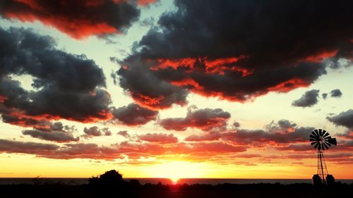 Scenic view of dramatic sky during sunset