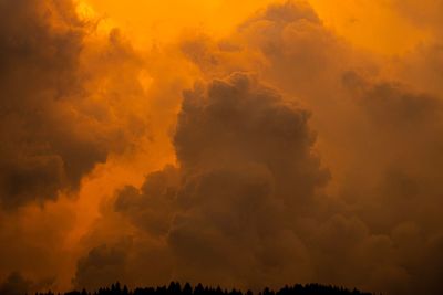 Low angle view of dramatic sky during sunset