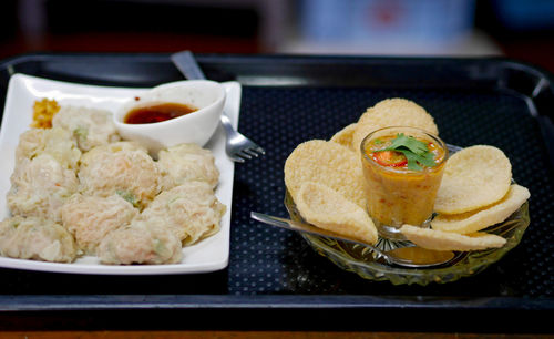 Close-up of food served on table