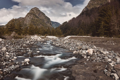 Scenic view of river stream against sky