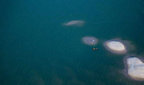 High angle view of boat sailing in sea