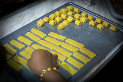 High angle view of person preparing food on table