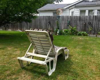 Chairs on lawn in yard