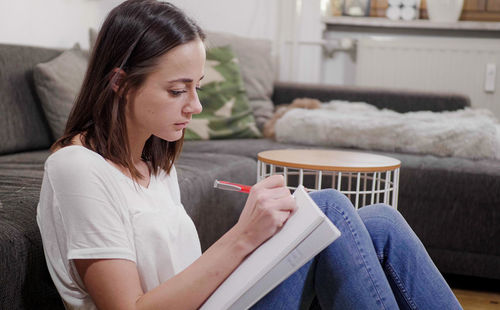 Young woman using mobile phone