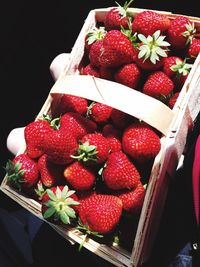 High angle view of strawberries in box