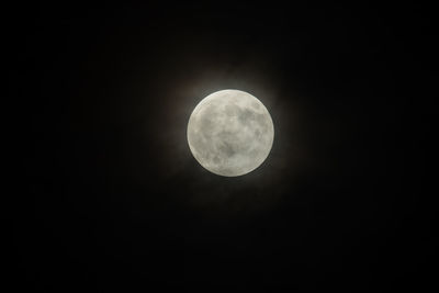 Low angle view of moon against sky at night