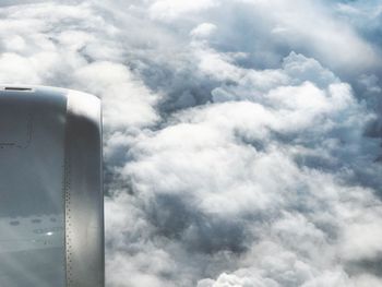 Low angle view of airplane flying in sky