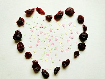 High angle view of heart shape cake on table