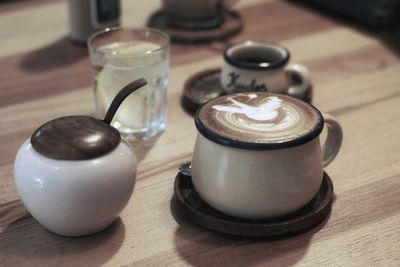 High angle view of coffee cup on table