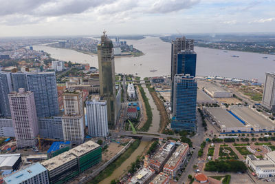 High angle view of buildings in city against sky