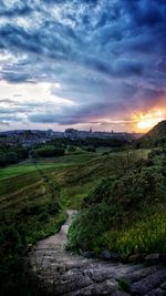 Scenic view of landscape against sky during sunset