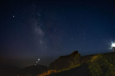 Scenic view of star field against sky at night