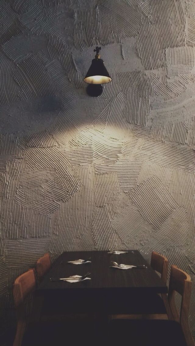 indoors, absence, empty, high angle view, lighting equipment, pattern, shadow, illuminated, no people, chair, ceiling, transportation, sunlight, railing, metal, wall - building feature, seat, day, close-up, built structure