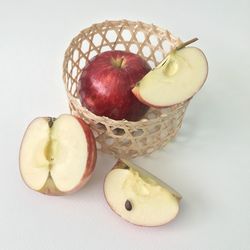 High angle view of fruits in basket on table