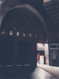 People walking in front of building