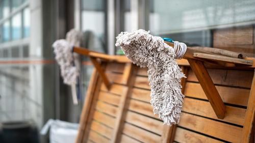 Close-up of rug hanging on table