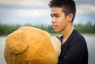 Portrait of young man standing outdoors