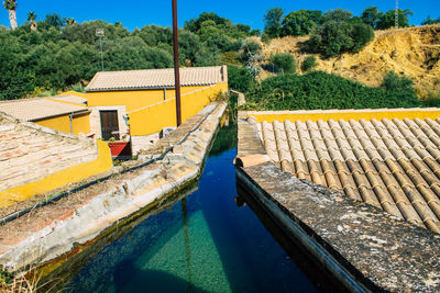 High angle view of swimming pool by river