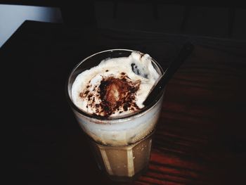 Close-up of ice cream in glass on table