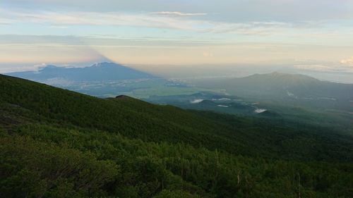 Scenic view of landscape against sky during sunset