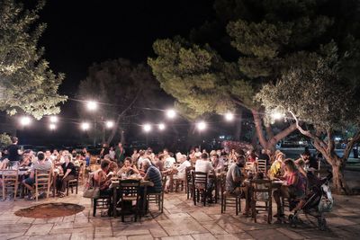 People sitting at outdoor restaurant