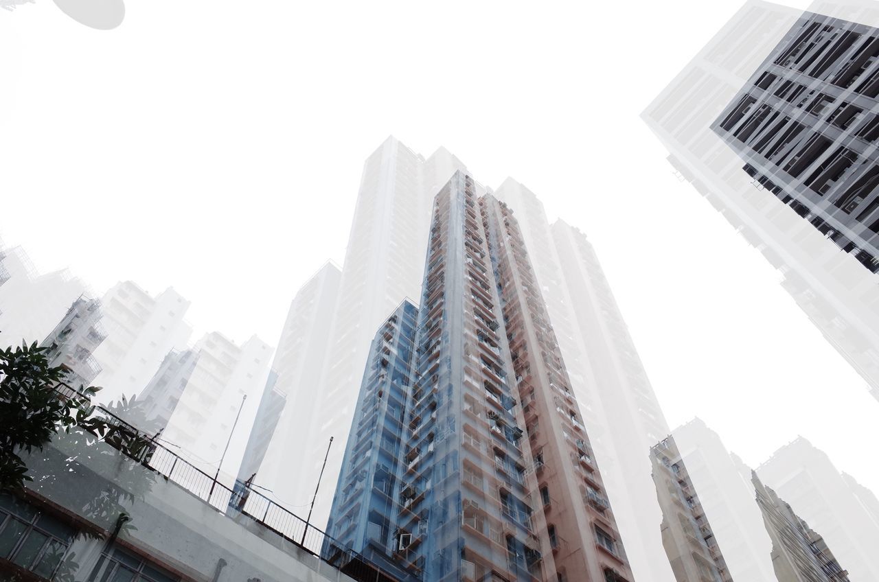 LOW ANGLE VIEW OF BUILDINGS AGAINST SKY