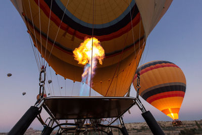 Low angle view of hot air balloon against clear sky