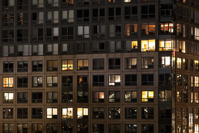 Low angle view of illuminated building at night